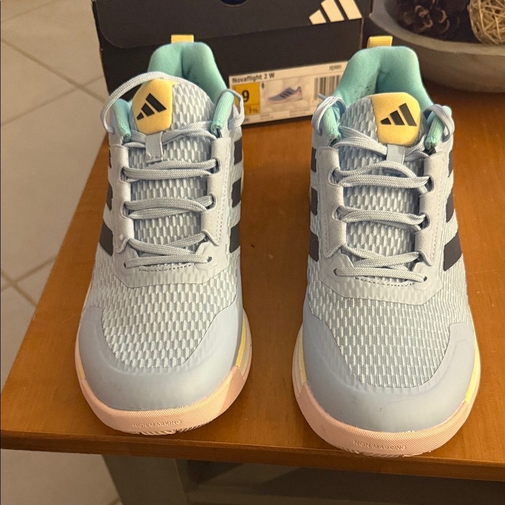 Woman's Adidas  Sky Blue Sneakers with Yellow Accents